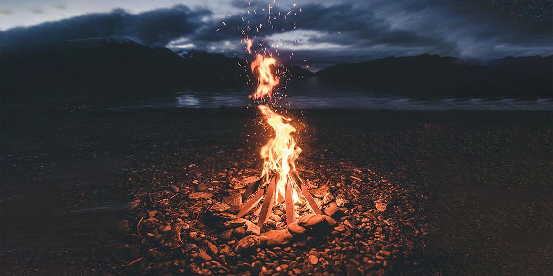 Campfire by lake