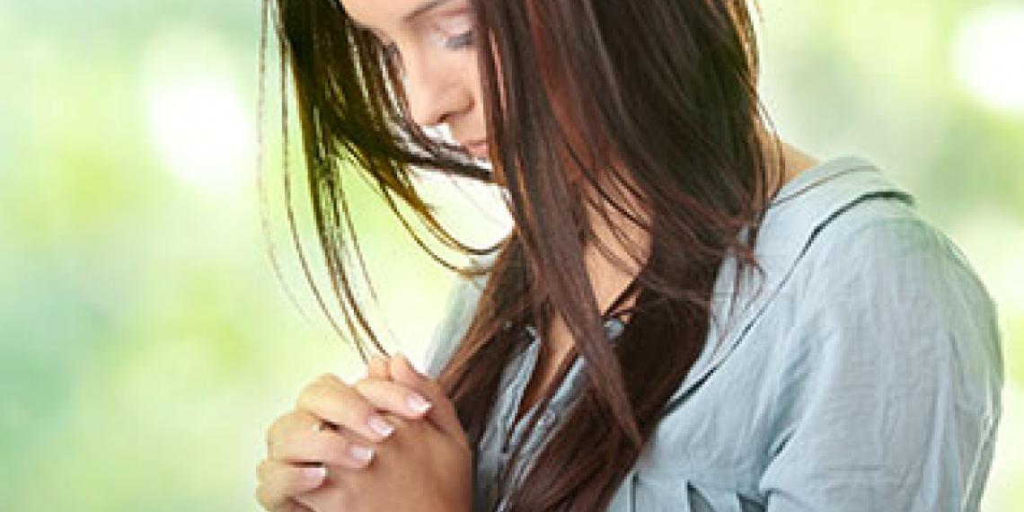 a woman in prayer
