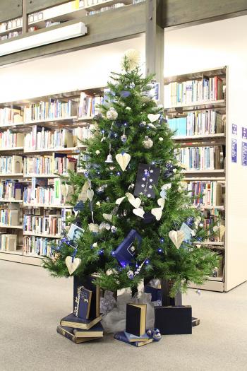 Christmas tree covered in books